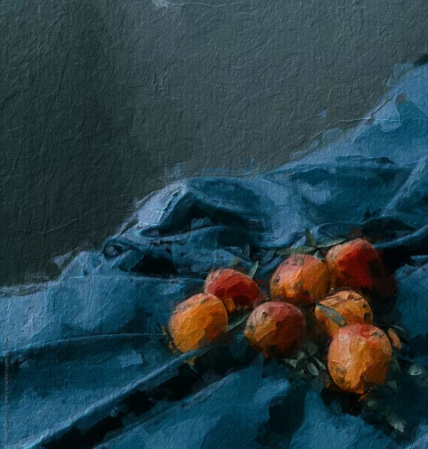 Still life of fruit on a dark blue fabric, set against a muted, textured background.